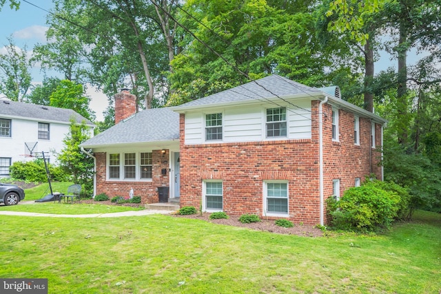 4408 Saul Rd, Kensington, MD 20895 - split level home with a chimney, a front yard, brick siding, and roof with shingles