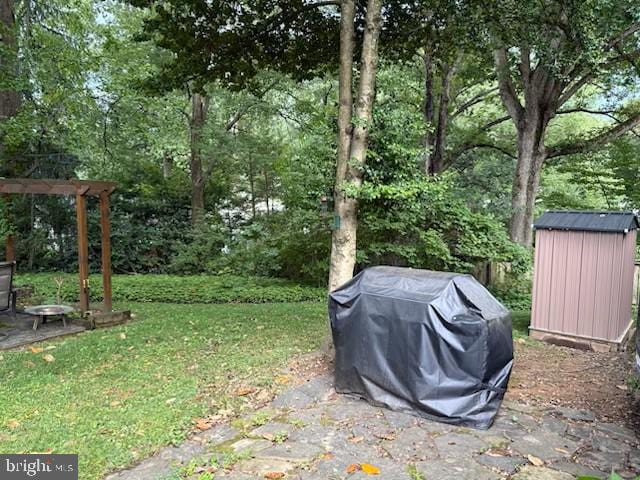 4408 Saul Rd, Kensington, MD 20895 - view of grassy yard with a shed
