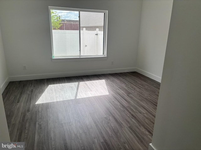 2209 N 7th St, Philadelphia, PA 19133 - spare room with dark wood-style floors
