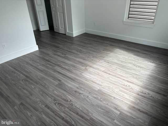 2209 N 7th St, Philadelphia, PA 19133 - spare room featuring dark wood-type flooring