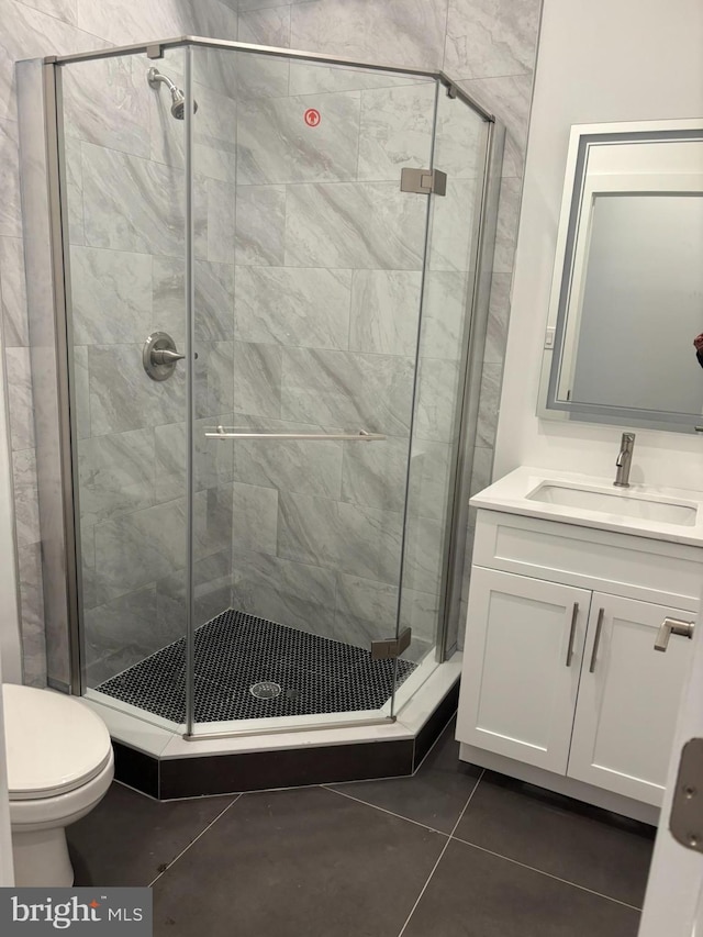 2209 N 7th St, Philadelphia, PA 19133 - bathroom with tile patterned flooring, vanity, and a stall shower