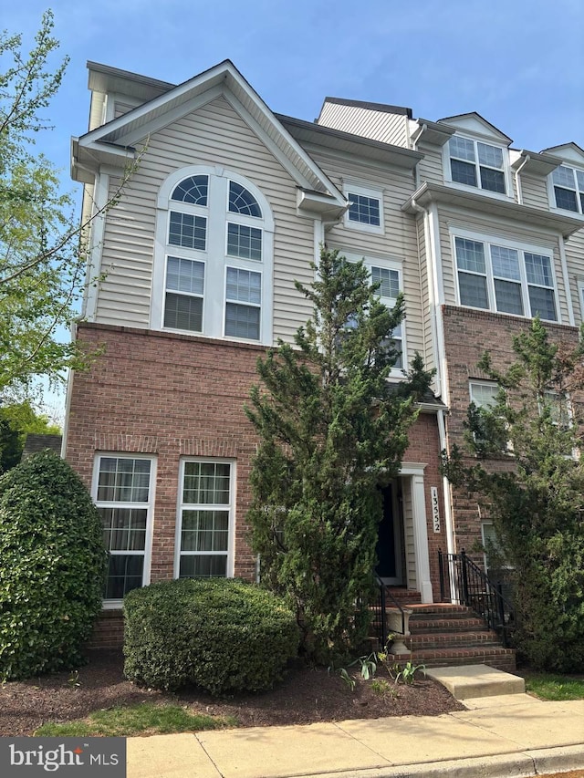 13552 Station St Unit 13552, Germantown, MD 20874 - view of property with brick siding