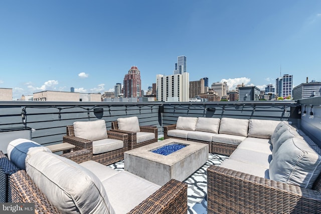 1217 Bainbridge St, Philadelphia, PA 19147 - patio / terrace featuring an outdoor living space with a fire pit and a skyline view