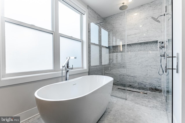 1217 Bainbridge St, Philadelphia, PA 19147 - full bathroom with a marble finish shower and a freestanding tub