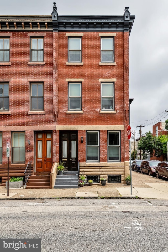 2101 Wallace St, Philadelphia, PA 19130 - view of property featuring brick siding and french doors