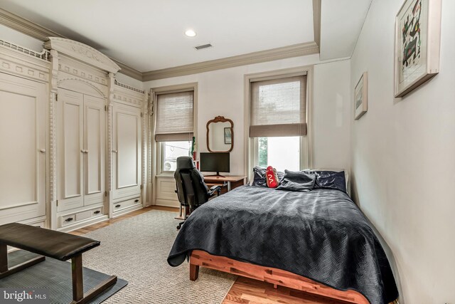 2101 Wallace St, Philadelphia, PA 19130 - bedroom with ornamental molding, wood finished floors, an office area, and recessed lighting