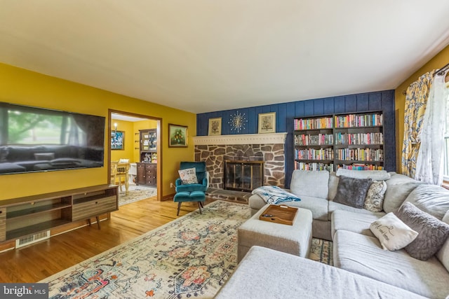 680 Davisville Rd, Warminster, PA 18974 - living room featuring wood finished floors and a fireplace