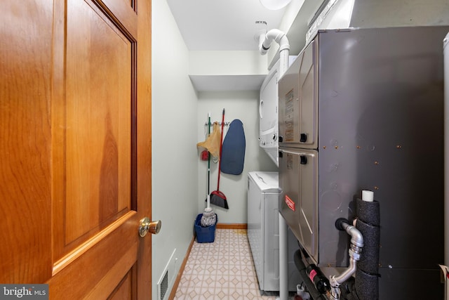 6203 Long Beach Blvd, Long Beach Township, NJ 08008 - washroom featuring light floors and estacked washer and dryer