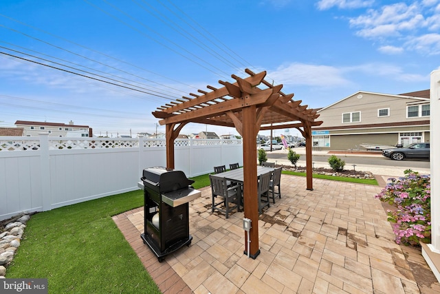 6203 Long Beach Blvd, Long Beach Township, NJ 08008 - view of patio with outdoor dining space, a pergola, and a grill
