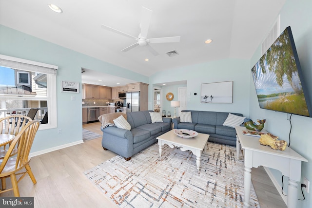 6203 Long Beach Blvd, Long Beach Township, NJ 08008 - living room with light wood-style floors, a ceiling fan, recessed lighting, and vaulted ceiling