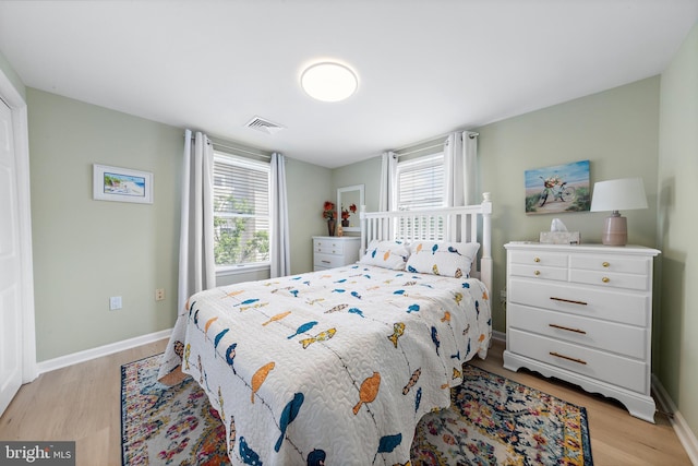 6203 Long Beach Blvd, Long Beach Township, NJ 08008 - bedroom with light wood-type flooring and baseboards