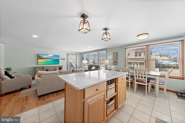 6203 Long Beach Blvd, Long Beach Township, NJ 08008 - kitchen featuring light tile patterned flooring, light brown cabinetry, open floor plan, recessed lighting, and a kitchen island