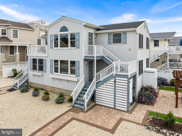 6203 Long Beach Blvd, Long Beach Township, NJ 08008 - rear view of house featuring stairway