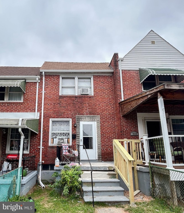 1536 Elrino St, Baltimore, MD 21224 - rear view of property with brick siding and a shingled roof