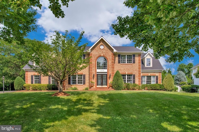 1506 White Tail Deer Ct, Annapolis, MD 21409 - view of front of property with brick siding and a front lawn