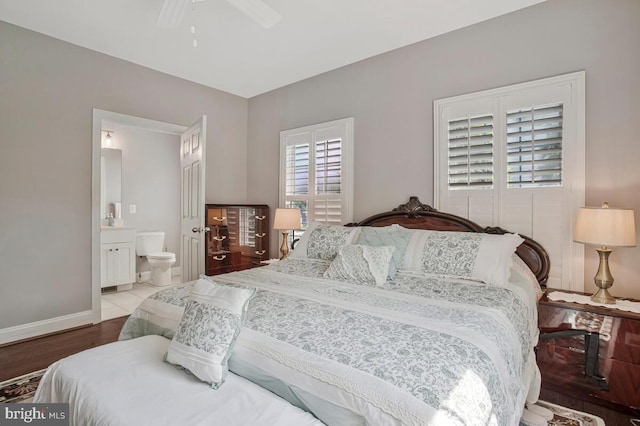 1506 White Tail Deer Ct, Annapolis, MD 21409 - bedroom featuring wood finished floors, ensuite bath, and a ceiling fan