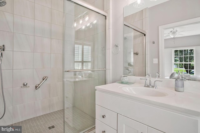 1506 White Tail Deer Ct, Annapolis, MD 21409 - bathroom featuring a shower stall, vanity, and a ceiling fan