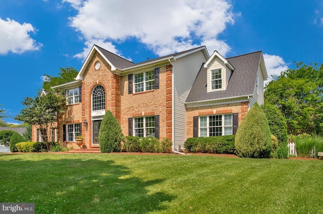 1506 White Tail Deer Ct, Annapolis, MD 21409 - georgian-style home with brick siding and a front lawn