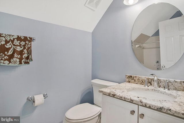 1506 White Tail Deer Ct, Annapolis, MD 21409 - bathroom featuring vanity, vaulted ceiling, and a shower