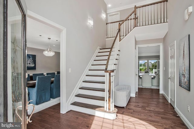 1506 White Tail Deer Ct, Annapolis, MD 21409 - entryway featuring wood finished floors, stairway, a chandelier, ornamental molding, and recessed lighting
