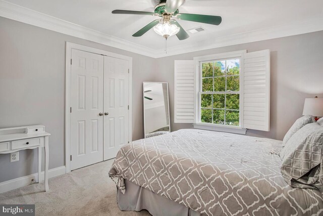 1506 White Tail Deer Ct, Annapolis, MD 21409 - bedroom with carpet floors, a closet, ornamental molding, and ceiling fan