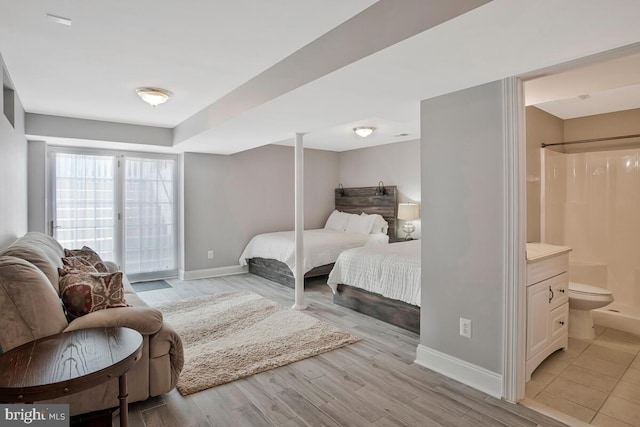 1506 White Tail Deer Ct, Annapolis, MD 21409 - bedroom featuring light wood-style flooring and ensuite bathroom