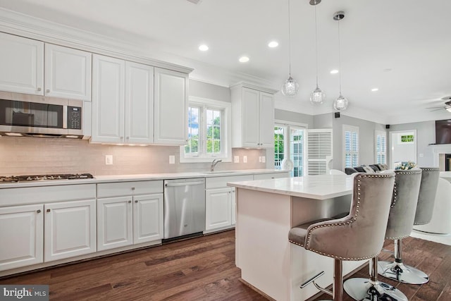 1506 White Tail Deer Ct, Annapolis, MD 21409 - kitchen with appliances with stainless steel finishes, recessed lighting, tasteful backsplash, white cabinetry, and light countertops