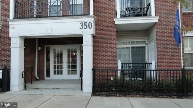 350 W Elm St Unit 3010, Conshohocken, PA 19428 - doorway to property with french doors and brick siding