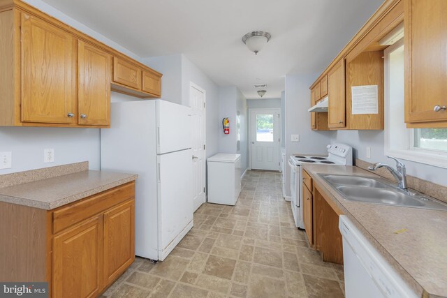 380 Fowser Rd, Millville, NJ 08332 - kitchen featuring white appliances, under cabinet range hood, light countertops, stone finish floors, and brown cabinetry