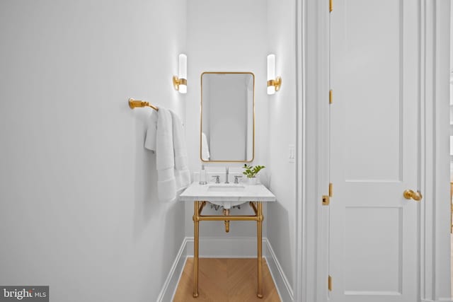 1834 16th St NW, Washington, DC 20009 - bathroom featuring baseboards and a sink