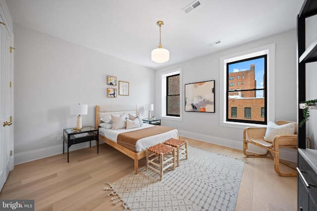 1834 16th St NW, Washington, DC 20009 - bedroom featuring light wood-style floors and baseboards
