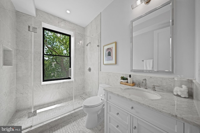 1834 16th St NW, Washington, DC 20009 - bathroom with a shower stall, vanity, and tile walls