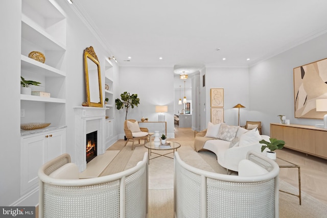1834 16th St NW, Washington, DC 20009 - living area featuring a warm lit fireplace, built in shelves, crown molding, and recessed lighting