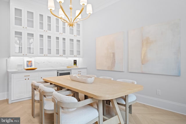 1834 16th St NW, Washington, DC 20009 - dining space with a chandelier, ornamental molding, and wine cooler