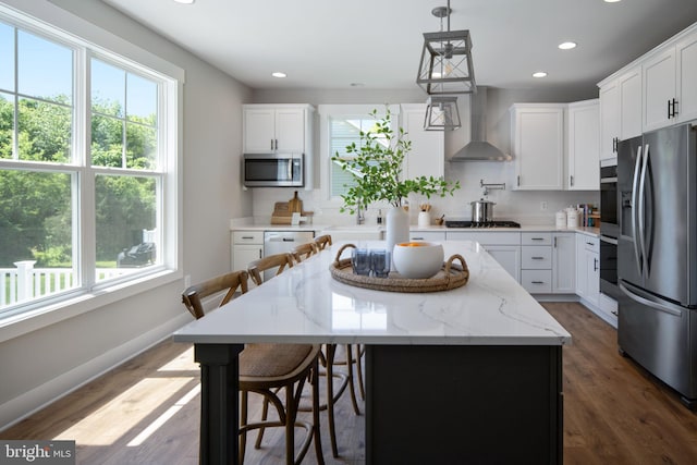 23 Old, Banks, Fredericksburg, VA 22406 - kitchen with appliances with stainless steel finishes, wall chimney exhaust hood, plenty of natural light, backsplash, and recessed lighting