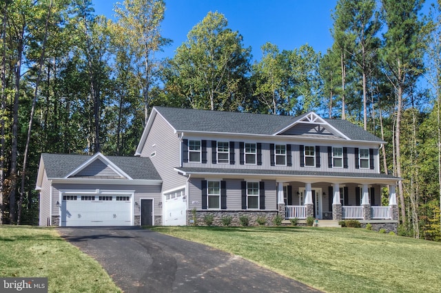 23 Old, Banks, Fredericksburg, VA 22406 - view of front of home featuring a porch, a front yard, driveway, and stone siding