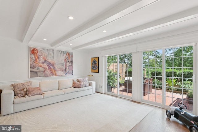 10905 Wickshire Way Unit G-2, North Bethesda, MD 20852 - unfurnished living room with beamed ceiling, wood finished floors, recessed lighting, a decorative wall, and a wainscoted wall