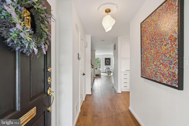 10905 Wickshire Way Unit G-2, North Bethesda, MD 20852 - foyer featuring wood finished floors and baseboards