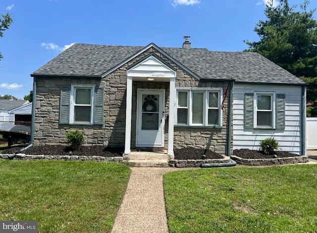 107 Philmar Ave, Cherry Hill, NJ 08003 - view of front of house featuring stone siding, a front lawn, roof with shingles, and a chimney