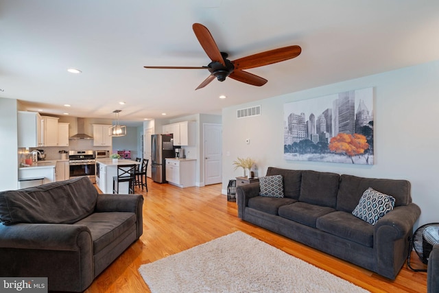 136 Tiller Ave, Manahawkin, NJ 08050 - living room with ceiling fan, light wood-style floors, and recessed lighting