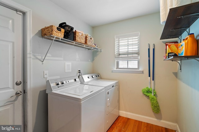 136 Tiller Ave, Manahawkin, NJ 08050 - washroom with separate washer and dryer and light wood-style flooring