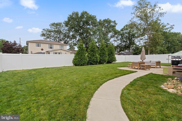 136 Tiller Ave, Manahawkin, NJ 08050 - fenced backyard with a patio and an outdoor hangout area