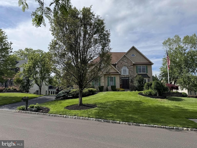 13 Cedar Crest Ct, Doylestown, PA 18901 - view of front of property featuring stone siding, a front lawn, and stucco siding