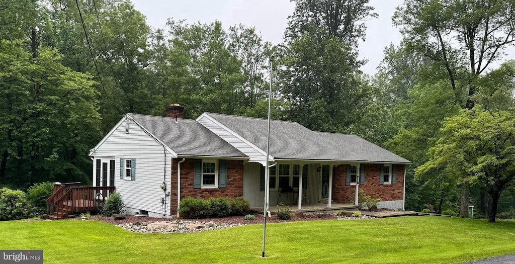 69 Crow Hill Rd, Barto, PA 19504 - ranch-style home featuring a porch, a chimney, a front lawn, roof with shingles, and brick siding