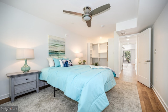 770 Fairview Ave Unit 770D, Annapolis, MD 21403 - bedroom with wood finished floors, ceiling fan, and a walk in closet