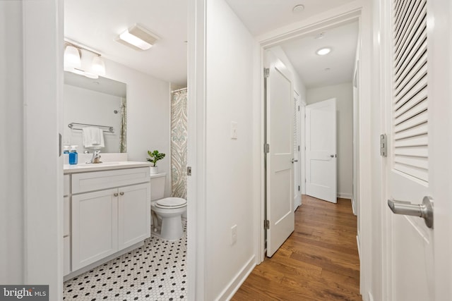 770 Fairview Ave Unit 770D, Annapolis, MD 21403 - full bathroom featuring vanity, wood finished floors, and a shower with curtain