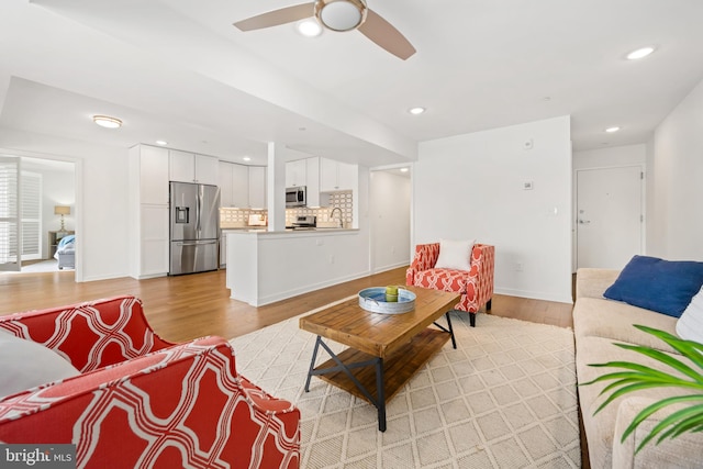 770 Fairview Ave Unit 770D, Annapolis, MD 21403 - living area featuring light wood-type flooring, a ceiling fan, and recessed lighting