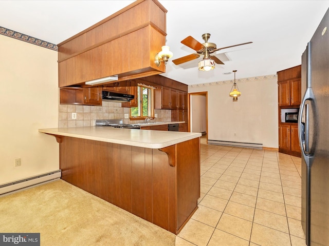 6505 Morningside Ct, Middletown, MD 21769 - kitchen featuring under cabinet range hood, a baseboard heating unit, a peninsula, a ceiling fan, and stove