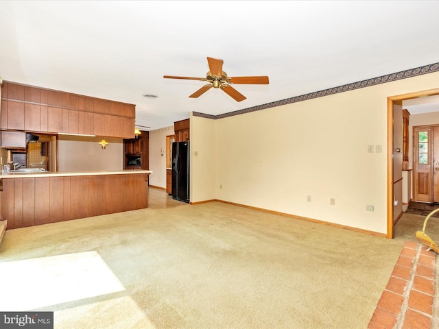 6505 Morningside Ct, Middletown, MD 21769 - unfurnished living room with light carpet and a ceiling fan