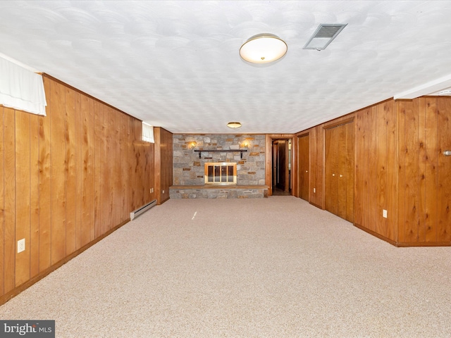 6505 Morningside Ct, Middletown, MD 21769 - finished basement featuring wooden walls, baseboard heating, carpet floors, and a stone fireplace